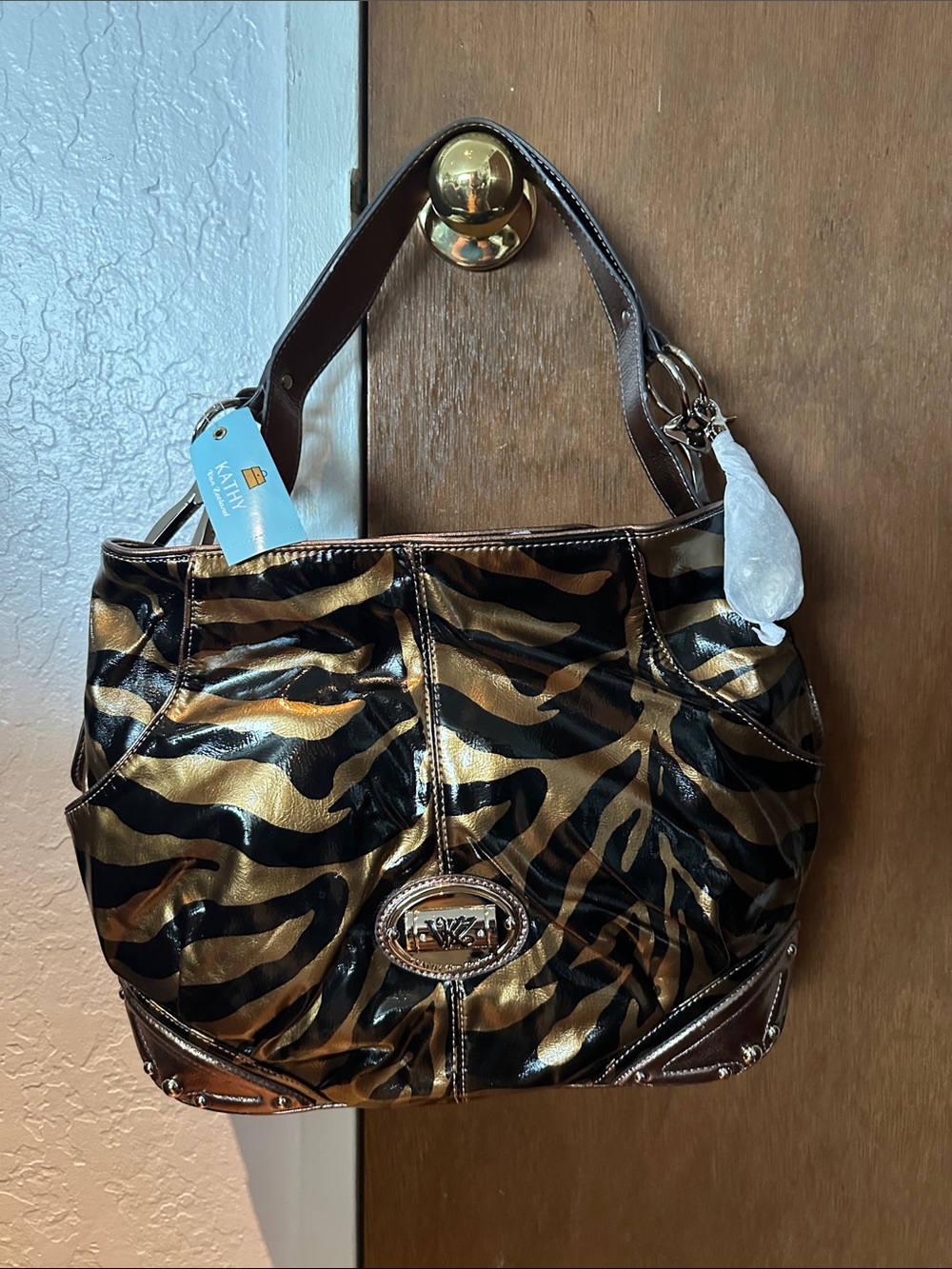 Kathy Van Zeeland Gold and Black Zebra-Print Shoulder Bag